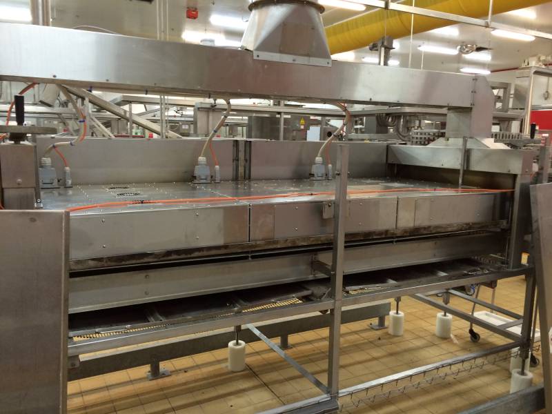 Línea de gratinado por infrarrojos de queso en Francia